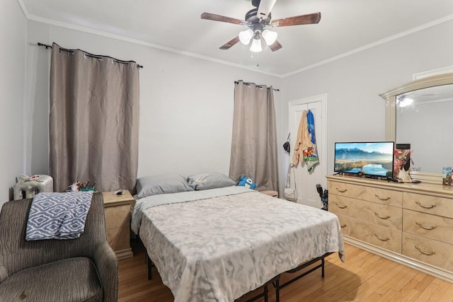 2115 W Arthur Ave, Chicago, IL 60645 - bedroom featuring wood finished floors, ornamental molding, and ceiling fan