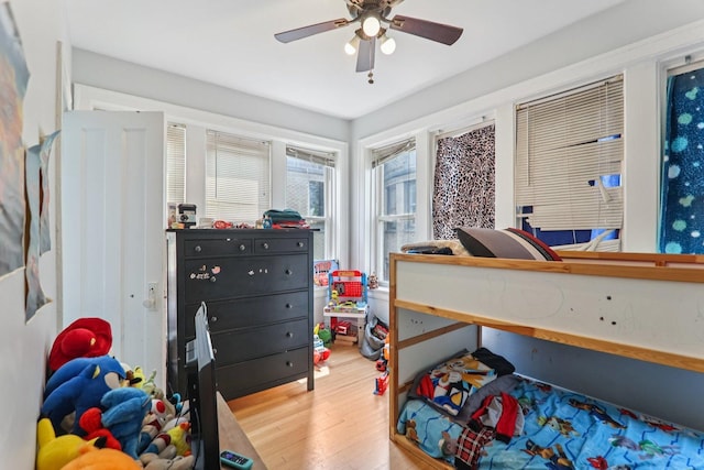 2115 W Arthur Ave, Chicago, IL 60645 - bedroom featuring light wood-style flooring and a ceiling fan