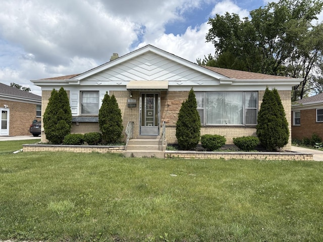 11138 Shaw St, Westchester, IL 60154 - view of front of house featuring brick siding and a front yard