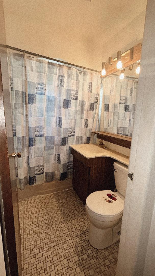 11138 Shaw St, Westchester, IL 60154 - bathroom featuring toilet and vanity