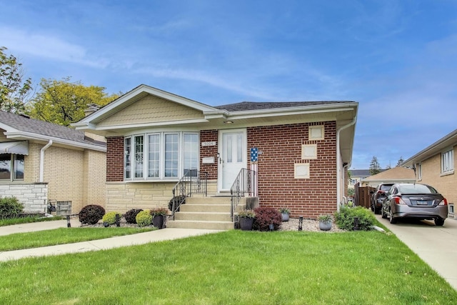 5004 N Knight Ave, Norridge, IL 60706 - bungalow-style home with a front yard and brick siding