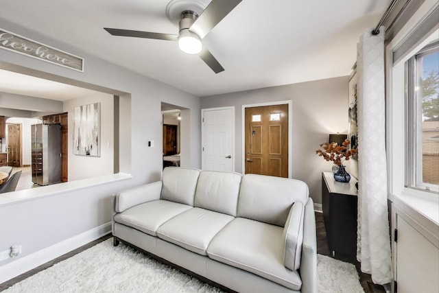 5004 N Knight Ave, Norridge, IL 60706 - living room with baseboards, ceiling fan, and wood finished floors