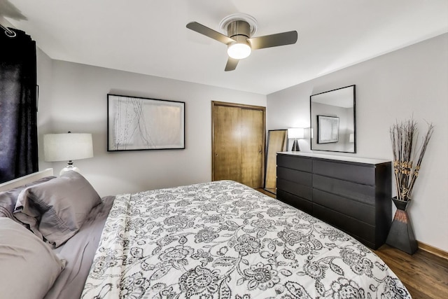 5004 N Knight Ave, Norridge, IL 60706 - bedroom featuring a closet, wood finished floors, baseboards, and ceiling fan