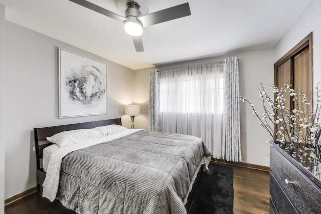 5004 N Knight Ave, Norridge, IL 60706 - bedroom with baseboards, wood finished floors, and ceiling fan