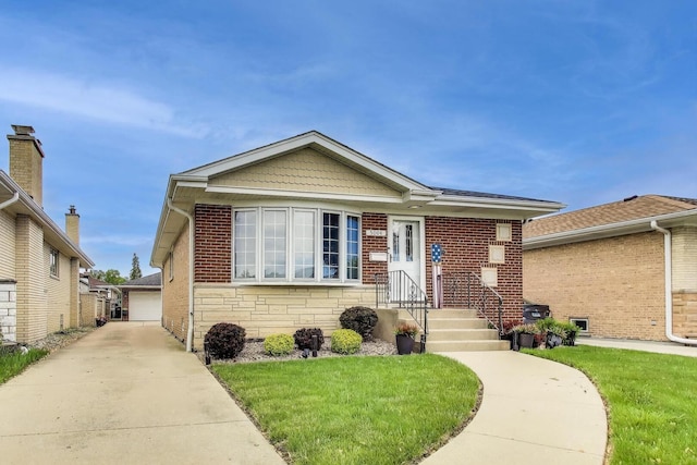 5004 N Knight Ave, Norridge, IL 60706 - bungalow-style home featuring a front yard, stone siding, a garage, and an outdoor structure