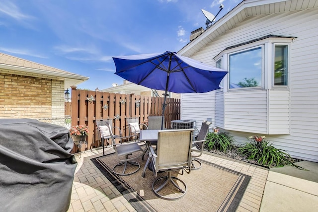5004 N Knight Ave, Norridge, IL 60706 - view of patio / terrace with outdoor dining space and central air condition unit