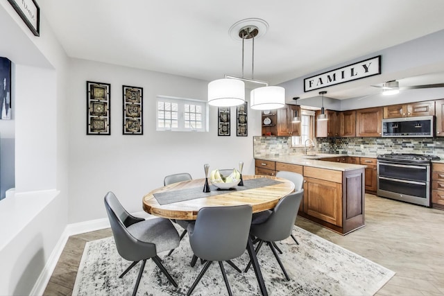 5004 N Knight Ave, Norridge, IL 60706 - dining area with plenty of natural light and baseboards