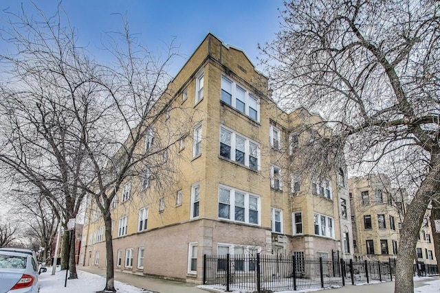 2160 N Mozart St Unit 3, Chicago, IL 60647 - snow covered building featuring a view of apartment building / complex