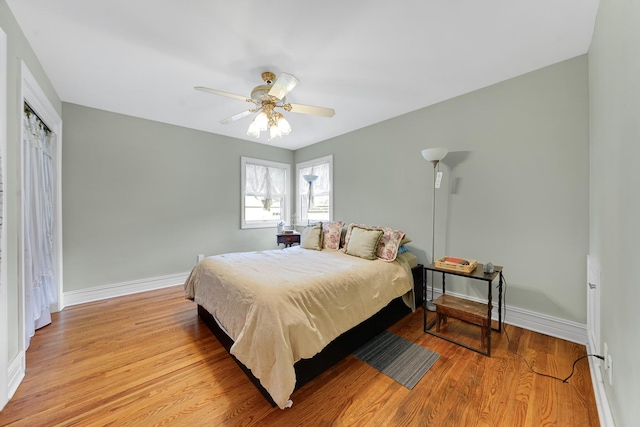 8819 Acorn Path, Wonder Lake, IL 60097 - bedroom featuring light wood-style flooring, baseboards, and a ceiling fan