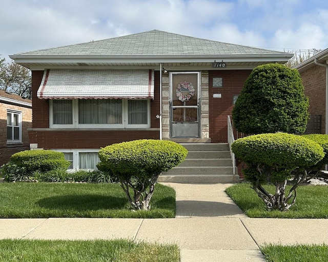7140 W 64th St, Chicago, IL 60638 - view of front of house featuring brick siding