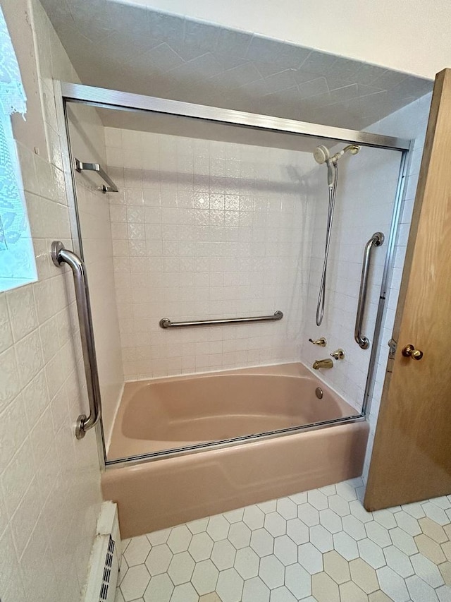 7140 W 64th St, Chicago, IL 60638 - full bath with shower / bath combination with glass door, tile patterned flooring, and a baseboard radiator