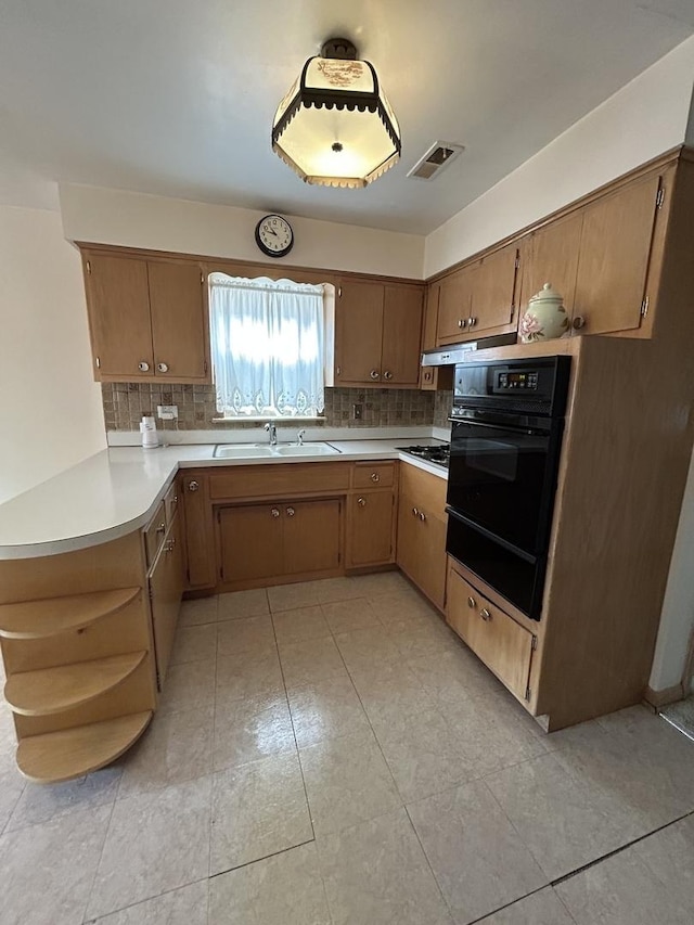 7140 W 64th St, Chicago, IL 60638 - kitchen featuring a warming drawer, open shelves, black oven, a peninsula, and decorative backsplash