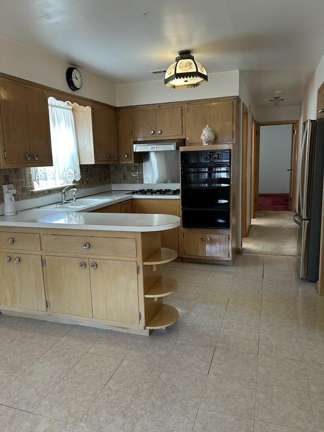 7140 W 64th St, Chicago, IL 60638 - kitchen featuring oven, a sink, freestanding refrigerator, a warming drawer, and under cabinet range hood