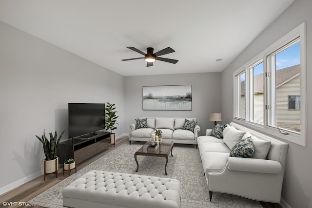 19463 Manchester Dr Unit 2, Mokena, IL 60448 - living area featuring baseboards, wood finished floors, and a ceiling fan