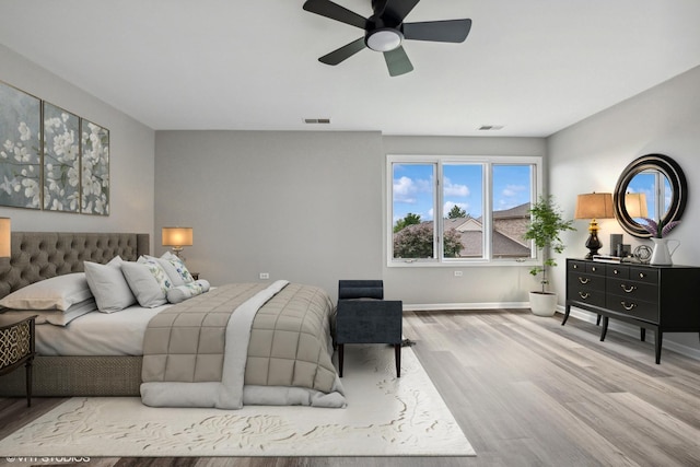 19463 Manchester Dr Unit 2, Mokena, IL 60448 - bedroom featuring wood finished floors, baseboards, and ceiling fan