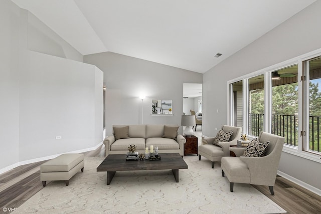 19463 Manchester Dr Unit 2, Mokena, IL 60448 - living area with lofted ceiling, wood finished floors, and baseboards
