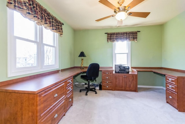 230 S Constitution Dr, Aurora, IL 60506 - home office featuring built in desk, light carpet, ceiling fan, and baseboards