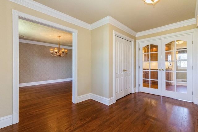 230 S Constitution Dr, Aurora, IL 60506 - empty room featuring a chandelier, wood finished floors, french doors, wallpapered walls, and baseboards