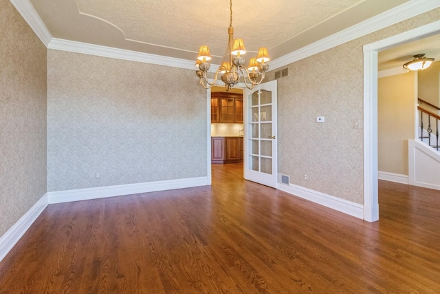 230 S Constitution Dr, Aurora, IL 60506 - spare room with wood finished floors, a chandelier, ornamental molding, wallpapered walls, and a textured ceiling
