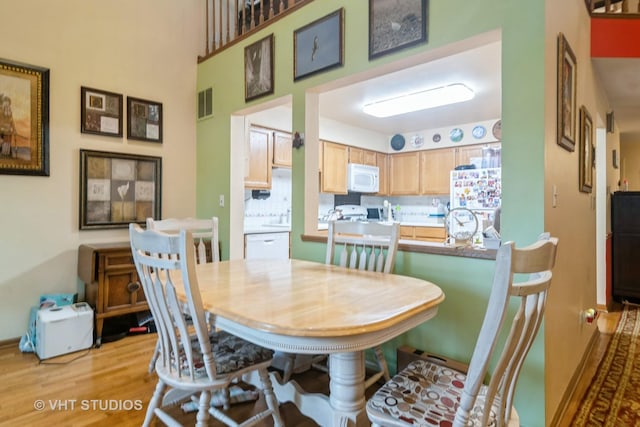 2133 Coldspring Rd, Arlington Heights, IL 60004 - dining room featuring light wood finished floors