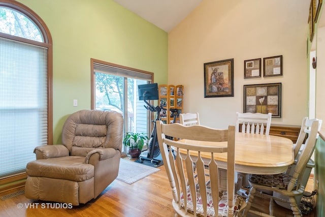 2133 Coldspring Rd, Arlington Heights, IL 60004 - dining room with high vaulted ceiling and light wood-style floors