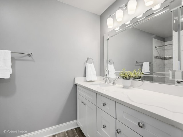 1465 Cantigny Way, Wheaton, IL 60189 - full bathroom with vanity, wood finished floors, a tile shower, and baseboards