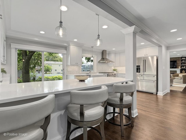 1465 Cantigny Way, Wheaton, IL 60189 - kitchen featuring wall chimney exhaust hood, high end appliances, light countertops, backsplash, and recessed lighting