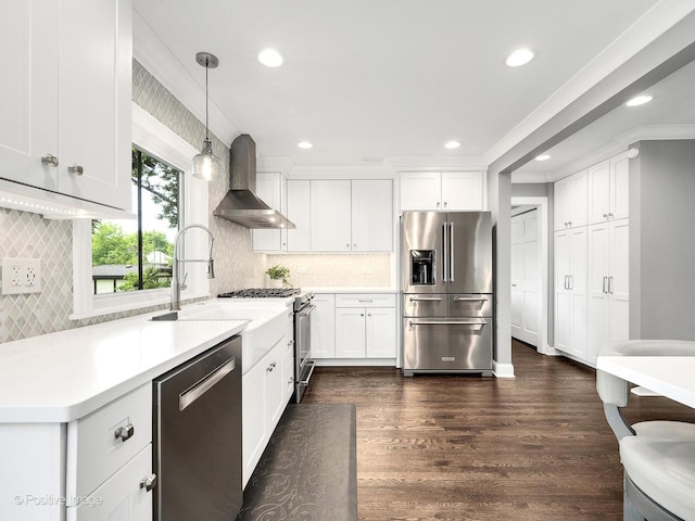 1465 Cantigny Way, Wheaton, IL 60189 - kitchen with appliances with stainless steel finishes, wall chimney exhaust hood, tasteful backsplash, white cabinets, and recessed lighting