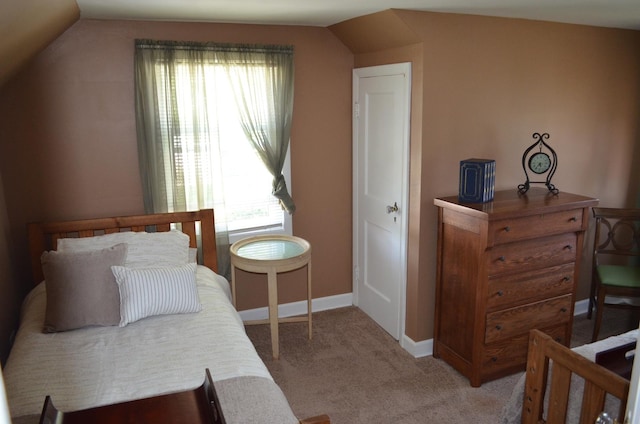 2655 W 97th Pl, Evergreen Park, IL 60805 - bedroom with multiple windows, lofted ceiling, light colored carpet, and baseboards