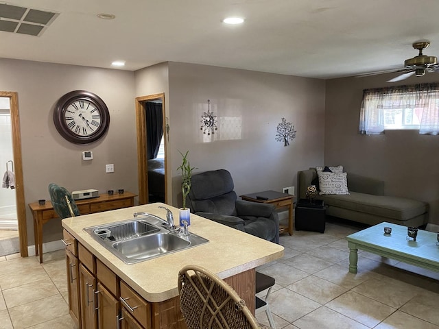 2655 W 97th Pl, Evergreen Park, IL 60805 - kitchen featuring a sink, open floor plan, light tile patterned floors, light countertops, and recessed lighting