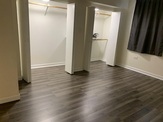 2655 W 97th Pl, Evergreen Park, IL 60805 - unfurnished bedroom featuring baseboards and dark wood finished floors