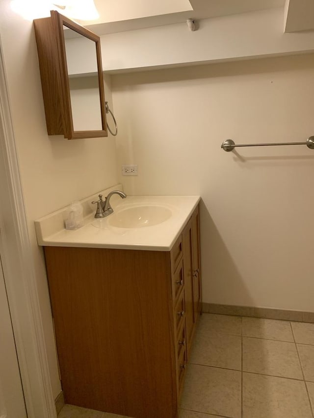 2655 W 97th Pl, Evergreen Park, IL 60805 - bathroom with vanity, tile patterned floors, and baseboards