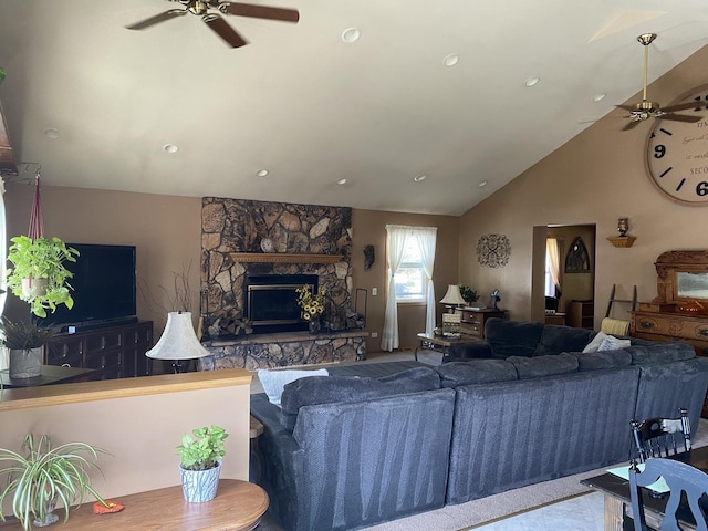 2655 W 97th Pl, Evergreen Park, IL 60805 - living room with a ceiling fan, a stone fireplace, vaulted ceiling, and recessed lighting