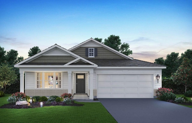 2278 Elderberry Ct, Wonder Lake, IL 60097 - view of front facade with concrete driveway, a front lawn, and a garage