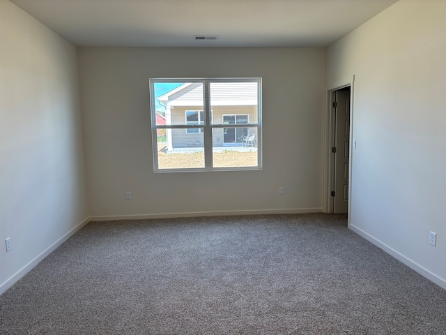 2278 Elderberry Ct, Wonder Lake, IL 60097 - carpeted spare room featuring baseboards