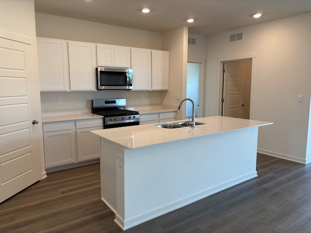2278 Elderberry Ct, Wonder Lake, IL 60097 - kitchen featuring stainless steel appliances, a sink, dark wood-style flooring, white cabinetry, and recessed lighting