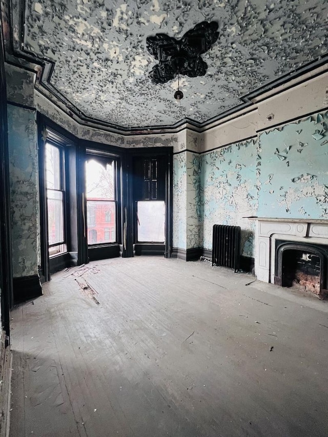 3362 S Giles Ave, Chicago, IL 60616 - unfurnished living room featuring a fireplace and wood finished floors