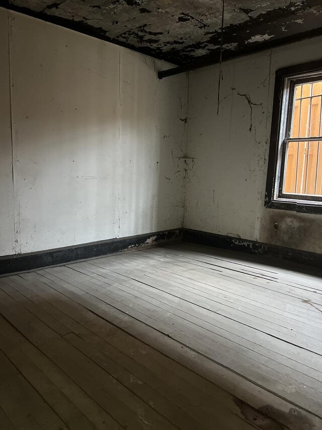 3362 S Giles Ave, Chicago, IL 60616 - unfurnished room featuring hardwood / wood-style floors