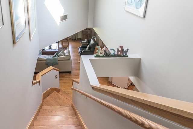 228 Cornell Ave, Des Plaines, IL 60016 - stairs with wood finished floors and lofted ceiling
