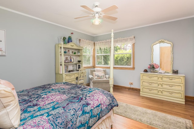 228 Cornell Ave, Des Plaines, IL 60016 - bedroom with light wood-type flooring, crown molding, baseboards, and ceiling fan