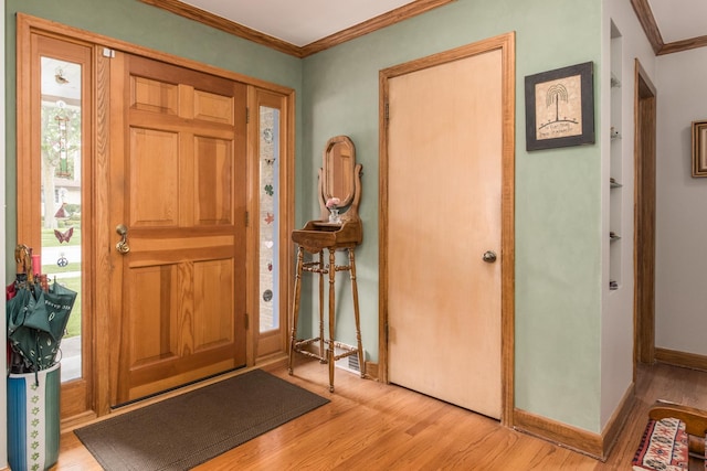 228 Cornell Ave, Des Plaines, IL 60016 - entryway with ornamental molding, light wood-style flooring, and baseboards