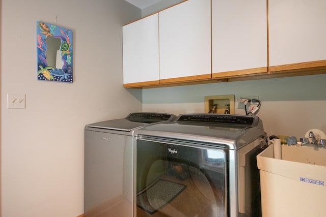 228 Cornell Ave, Des Plaines, IL 60016 - washroom featuring cabinet space and washer and dryer