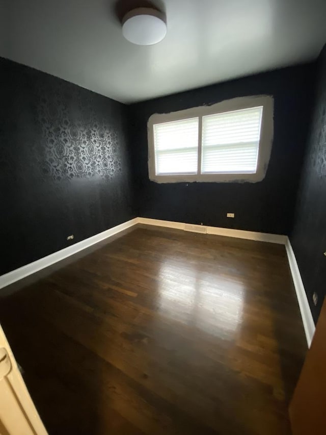 16133 Cambridge Dr, Markham, IL 60428 - spare room featuring dark wood-type flooring and baseboards