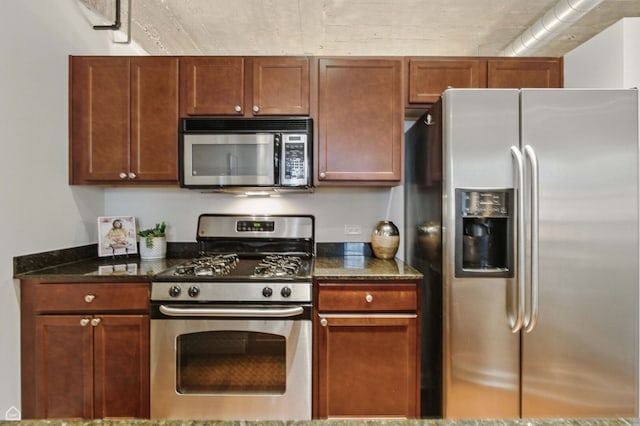 1111 W 14th Pl Unit 211, Chicago, IL 60608 - kitchen featuring appliances with stainless steel finishes and dark stone counters