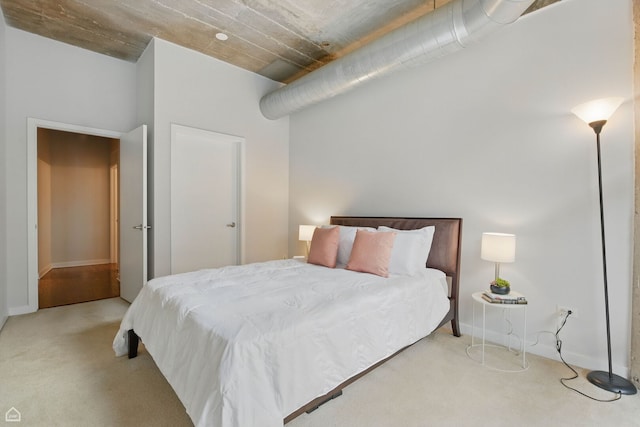 1111 W 14th Pl Unit 211, Chicago, IL 60608 - carpeted bedroom with baseboards