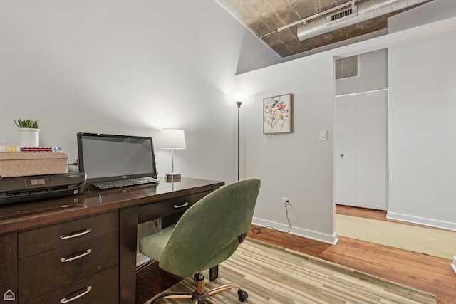 1111 W 14th Pl Unit 211, Chicago, IL 60608 - office area with wood finished floors and baseboards