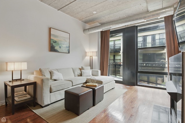 1111 W 14th Pl Unit 211, Chicago, IL 60608 - living room with wood finished floors