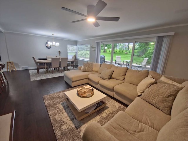 1762 W Palatine Rd, Inverness, IL 60067 - living room with a ceiling fan, dark wood-style flooring, a chandelier, crown molding, and baseboards