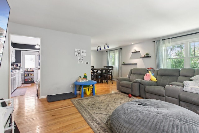 6100 Ridgeway Dr, Woodridge, IL 60517 - living room with light wood-style floors