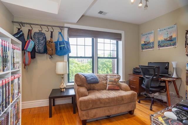 1239 W Jarvis Ave Unit 3, Chicago, IL 60626 - office area featuring wood finished floors and baseboards